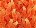 Bouteilles soda orange sucrées